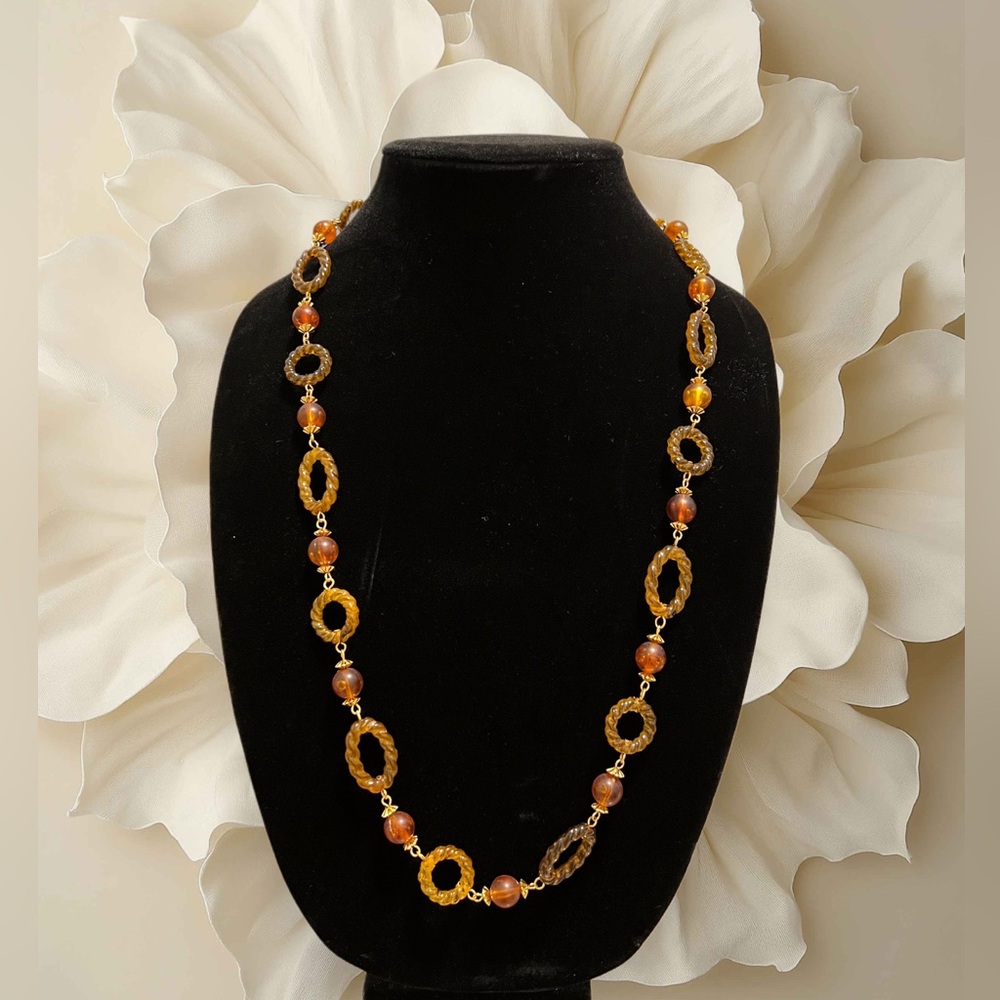 Plastic Faux Amber Brown and circle connected with beaded necklace